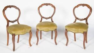 A set of three Victorian mahogany balloon back chairs 