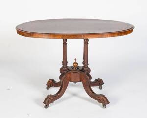 A Victorian oval walnut veneered tea table. 71cm high, 106cm wide, 60cm deep