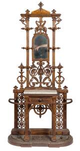 A Colebrookdale style cast iron hallstand, circa 1880 with diamond pattern registration mark. 200cm high, 92cm wide, 32cm deep