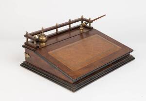 A walnut desk-top writing compendium, late 19th Century. 18cm high, 45cm wide, 35cm deep 