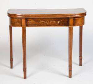 A Georgian mahogany fold over tea table with cross banded edge & decorative barber pole & satinwood string inlay, early 19th Century. 74cm high, 92cm wide, 45cm deep