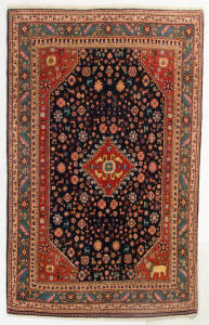 Persian hand knotted woollen rug with animal motif. Length 225cm, width 145cm.