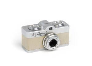 MEOPTA (Czechoslovakia): Mikroma II, 1959 sub-miniature camera with Mirar f3.5 20mm lens, the body in scarce beige leather covering. Also a View-Master Personal Stereo Camera in brown & beige finish. (2 cameras)