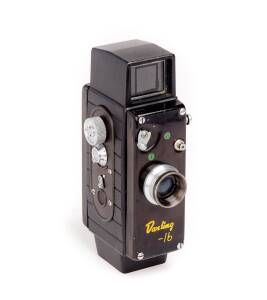 SHINCHO SEIKI (Japan): Darling-16, c1957, vertically styled subminiature camera for 10x12mm exposures on 16mm cassettes (one present). Bakelite body with metal front and back.