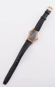 A gentleman's wristwatch, Bulova, circa 1940's, rolled gold case, applied gold painted Arabic and baton markers, subsidiary seconds, non-original leather strap. 