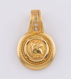 A coin pendant enhancer, with diamond set bail and applied twist decoration. 18ct yellow gold. Weight 12.95 grams. Length 3.5cm. Width 2.2cm.