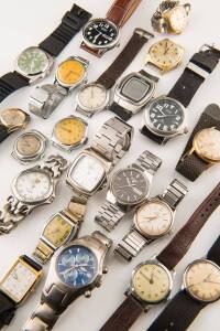 A collection of assorted wristwatches including Roamer and Edox.