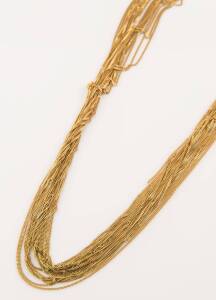 A multi-strand gold necklace, Vieri. 18ct yellow gold. Weight 81 grams. Length 90cm. 