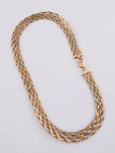 A two-tone necklace, of eight strand woven design. 18ct yellow and white gold. Weight 42.18 grams. Length 45cm. Width 1.5cm.