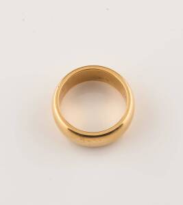 A band ring, of heavy domed form. 18ct yellow gold. Weight 24.2 grams. Ring size Y1/2