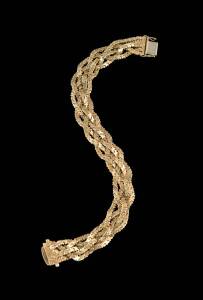 A plaited gold bracelet, five strand design. 18ct yellow gold. Weight 52.60 grams. Length 19.5cm.