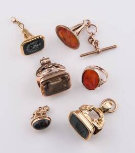 Five various seals including carnelian and bloodstone and a carnelian intaglio ring. 9ct, 14ct and 18ct yellow and rose gold. 