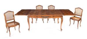 A French provincial parquetry dining table together with four side chairs, 20th Century. * TO MEASURE