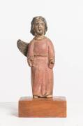 A small naïve wooden carving of a saint, possibly Portuguese, 18/19th Century. 22cm high.