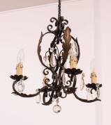 A wrought metal & glass four branch hanging light. 50cm high, 45cm wide