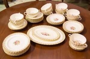 A Royal Worcester " Kempsey" patterned English porcelain dinner ware originally a setting for 12 people 