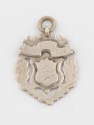 SPORT MEDALS, 1901 Bush Rats FC sterling silver fob/medal engraved on reverse "A.C.Wilson, Capt'n, Bush Rats F.C., 1901"; plus 1906 medal engraved on front "N.D.F.L. Schools Compet. 1906". - 2