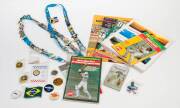 BADGES/PINS, interesting collection with Commonwealth Games, Olympics & World Masters Games; 1977 World Series Cricket cards [56] in plastic case; WSC programme; ABC Cricket books (2); "Following the Flame" book.
