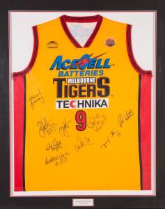 MELBOURNE TIGERS: Melbourne Tigers singlet signed by 2004 team, with 9 signatures, window mounted, framed & glazed, overall 96x118cm.  [Proceeds to Kids Under Cover].