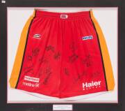 MELBOURNE TIGERS: Melbourne Tigers shorts signed by 2007-08 Championship team, with 15 signatures, window mounted, framed & glazed, overall 105x94cm.  [Proceeds to Kids Under Cover].