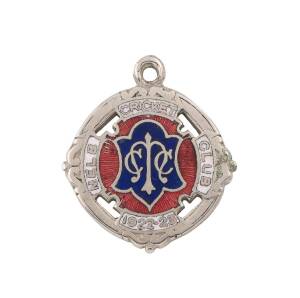 MELBOURNE CRICKET CLUB, 1922-23 membership badge, made by Bentley, No.2712, enamel on polished white metal.