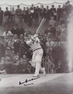 DON BRADMAN, signed photographs, including one of Bradman practicing in the nets.