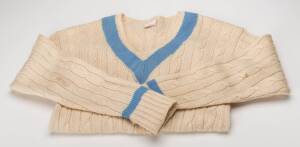 1971-72 World XI jumper, with pale blue band, endorsed on label "GAV"'. Good condition. Rare jumper. [The World XI Tour of Australia was organised to replace the cancelled South African tour, the World XI squad included Gary Sobers, Clive Lloyd, Sunil Gav