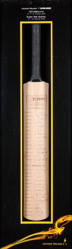 2005 AUSTRALIA v WORLD XI, full size Cricket Bat signed by both teams, with 28 signatures including Ricky Ponting, Adam Gilchrist, Michael Clarke, Shaun Pollock & Shoaib Akhtar. Fine condition in attractive display case, 40x110cm. With CoA.