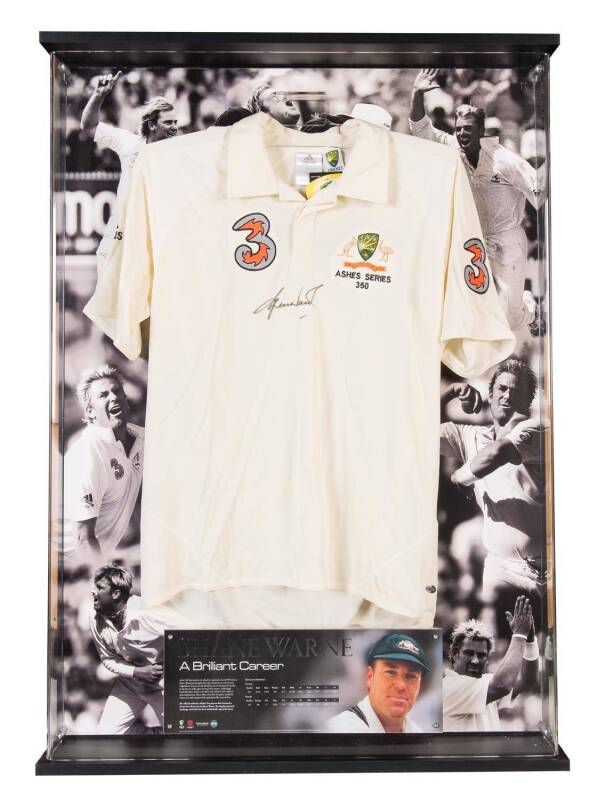 SHANE WARNE: "A Brilliant Career" display comprising signature on replica Test shirt, mounted in attractive display case, overall 79x108cm. Limited edition 157/250, with CoA.