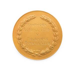 1962 HAWTHORN V MELBOURNE: Medal, engraved "T.M.Ferguson Memorial Trophy, 7th July 1962", and on reverse "Hawthorn Football Club v Melbourne Football Club", 51mm diameter, in original K.G.Luke presentation case.