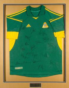 2001 AUSTRALIAN SOCCEROOS, shirt with 19 signatures, framed & glazed, overall 93x114cm.