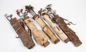 GOLF CLUBS: Large accumulation of golf clubs (147) & golf bags (9), with about 70 golf clubs with wooden shafts. Poor/G condition.