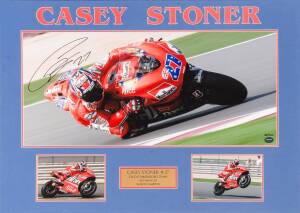 CASEY STONER, signed action photograph, limited edition 88/250, window mounted with two other photos, framed & glazed, overall 68x91cm. With CoA.