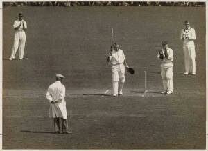 1930 AUSTRALIAN TOUR TO ENGLAND: Glarrie Grimmett's photograph album, containing 12 press photographs from the Test matches, with page of captions.