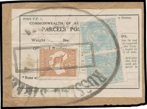 ONE SHILLING & FOURPENCE: 1/4d greenish blue horizontal pair (+ 6d brown Kangaroo) tied to a complete 'PARCELS POST' label on slightly larger piece by a generally fine strike of the huge rubber 'RUSSELL STREET/VICTORIA' parcels cancellation, some creasing