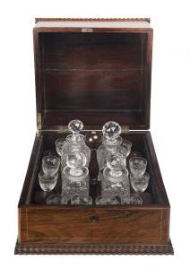 An antique liqueur set rosewood box with sting inlay, includes 4 decanters & 12 glasses, 19th Century. 23cm high, 30cm wide, 31cm deep.