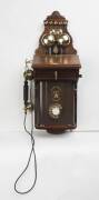 An Ericsson antique wall mounted telephone (restored & working). 