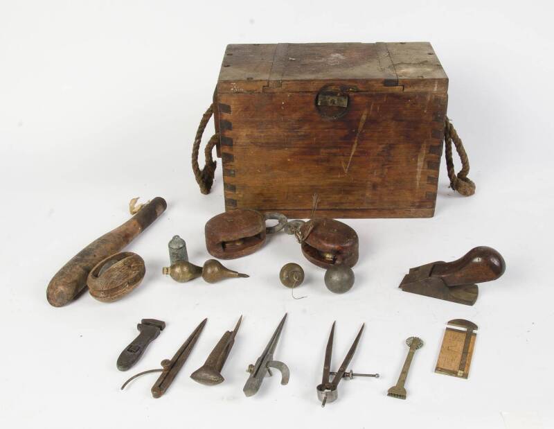 A sail makers tool box and associated tools, including plumb bobs, pulleys, plane etc. (18 items).