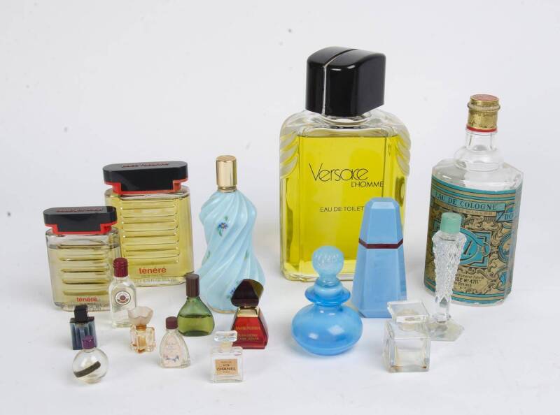 A collection perfume bottles including point of sale large display bottles, Versace L'homme, Chanel No. 5 and Paco Rabanne. (17 items). Tallest 27cm.