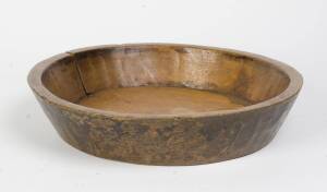 A large provincial fruitwood treenware bowl. 49cm diameter 