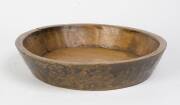 A large provincial fruitwood treenware bowl. 49cm diameter 