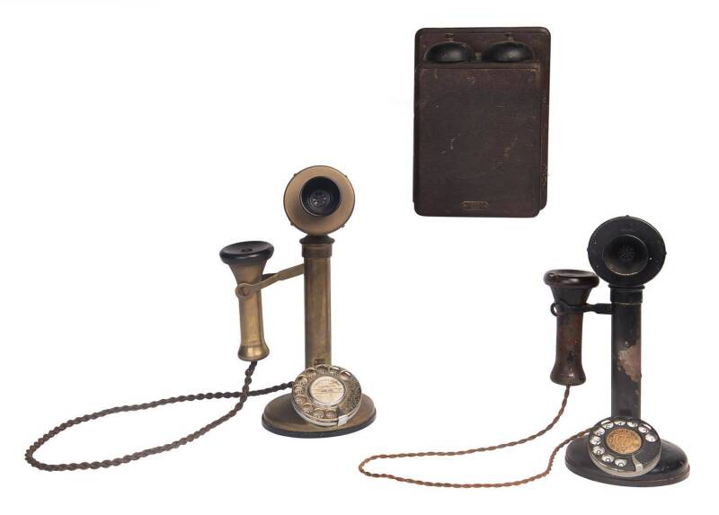 An early candlestick telephone with bell set, together with a brass candlestick phone. 31cm