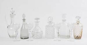 A group of six decanters including Stuart crystal plus a set of 4 Waterford crystal wine glasses. 