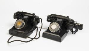 Two black Bakelite phones, first half of the 20th Century.