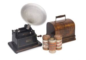 A Thomas Edison "Gem" table model cylinder phonograph in an oak case with 5 cylinders, Circa 1905 with later horn.   