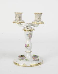 A Herrend porcelain candelabra. 23cm high