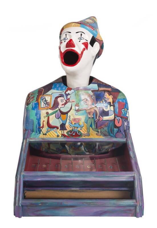 A pair of fairground laughing clowns each hand painted, purported to have come from Luna Park Sydney and then decorated at Melbourne V.C.A. 74cm high.