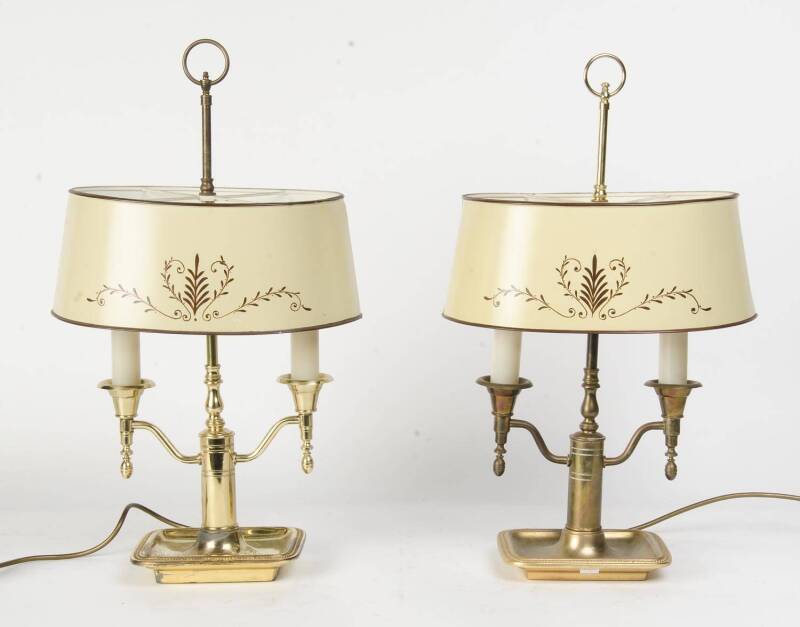 A pair of brass tole lamps