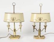 A pair of brass tole lamps