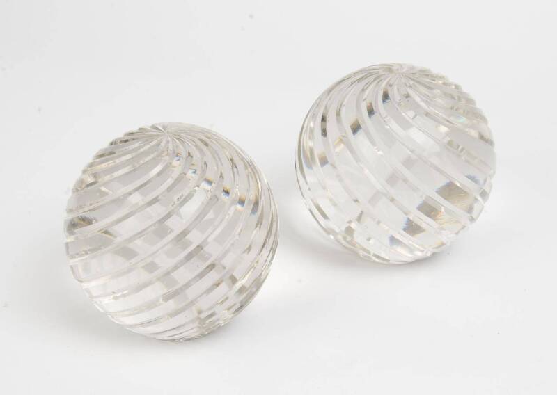 A pair of cut glass spheres. 12cm.